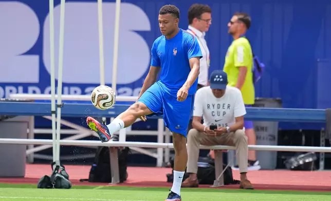 France's Kylian Mbappe participates in a training session ahead of the team's semifinal soccer match against Spain, Monday, July 13, 2026, in Dallas. (AP Photo/Julio Cortez)