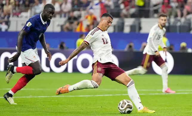 Spain's Pedro Porro scores his side's second goal during the World Cup semifinal soccer match between France and Spain in Arlington, Texas, near Dallas, Tuesday, July 14, 2026. (AP Photo/Ashley Landis)