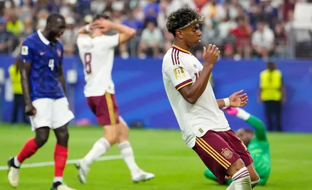 Spain's Lamine Yamal (19) reacts during the World Cup semifinal soccer match between France and Spain in Arlington, Texas, near Dallas, Tuesday, July 14, 2026. (AP Photo/Tony Gutierrez)