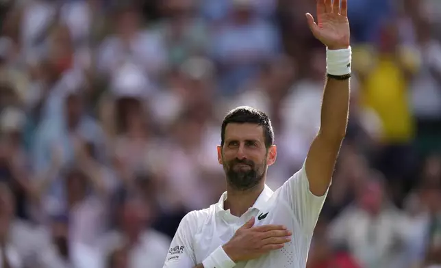 Novak Djokovic of Serbia celebrates his victory against Roman Saffiulin of Russia in their fourth round men's singles match at the Wimbledon Tennis Championships in London, Sunday, July 5, 2026. (AP Photo/Brian Inganga)