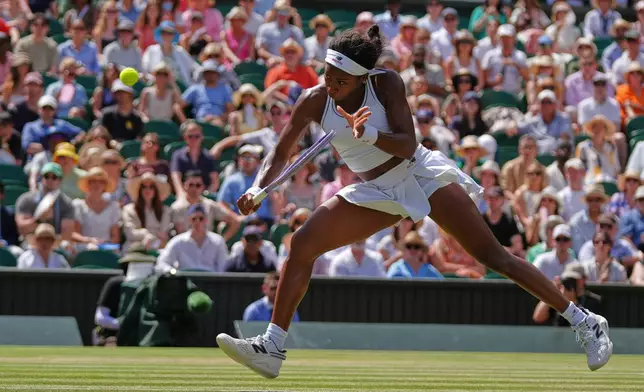 Coco Gauff of the United States returns the ball during the women's singles quarter-final match against Jessica Pegula of the United States at the Wimbledon Tennis Championships in London, Tuesday, July 7, 2026.(AP Photo/Maja Smiejkowska)