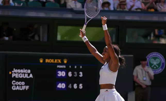 Coco Gauff of the United States celebrates winning the women's singles quarter-final match against Jessica Pegula of the United States at the Wimbledon Tennis Championships in London, Tuesday, July 7, 2026.(AP Photo/Maja Smiejkowska)