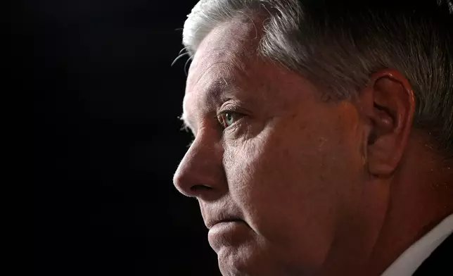 FILE - Sen Lindsey Graham, R-S.C., speaks to the media before the CBS News Republican presidential debate at the Peace Center, Saturday, Feb. 13, 2016, in Greenville, S.C. (AP Photo/Rainier Ehrhardt, File)