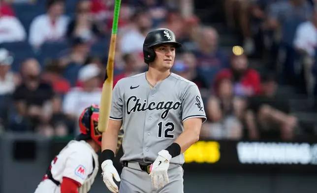 Chicago White Sox's Colson Montgomery (12) tosses his bat after striking out in the fifth inning of a baseball game against the Cleveland Guardians in Cleveland, Thursday, July 2, 2026. (AP Photo/Sue Ogrocki)