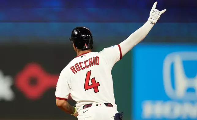 Cleveland Guardians' Brayan Rocchio celebrates as he runs the bases after hitting a game winning home run in the ninth inning of a baseball game against the Chicago White Sox in Cleveland, Thursday, July 2, 2026. (AP Photo/Sue Ogrocki)