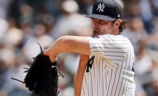 New York Yankees pitcher Gerrit Cole reacts in the fifth inning during the first baseball game of a doubleheader against the Pittsburgh Pirates, Wednesday, July 22, 2026, in New York. (AP Photo/Adam Hunger)