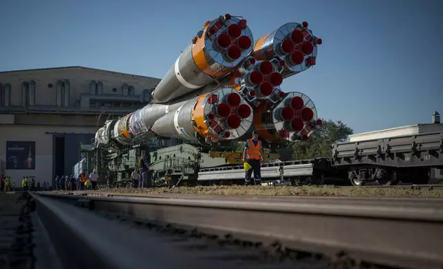The Soyuz rocket is rolled out by train to the launch pad, Saturday, July 11, 2026, at Site 31 of the Baikonur Cosmodrome in Kazakhstan. (Bill Ingalls/NASA via AP)