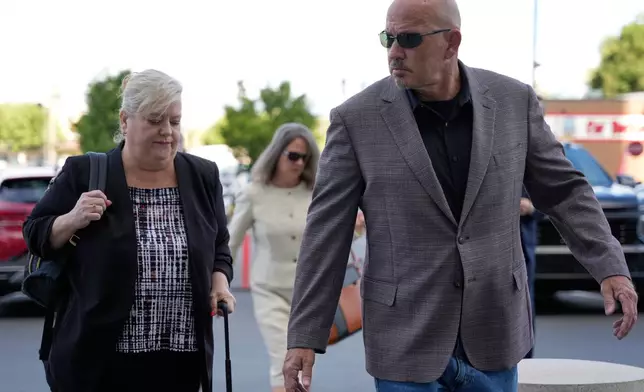 Attorney Kathryn Nester, left, arrives at the Fourth District Courthouse for a hearing for Tyler Robinson, accused in the fatal shooting of Charlie Kirk, Monday, July 6, 2026, in Provo, Utah. (AP Photo/Marielle Scott)