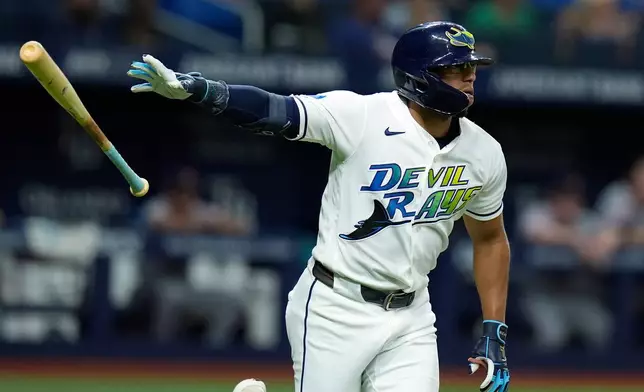 Tampa Bay Rays' Richie Palacios drops his bat as he watches his three-run home run off Cleveland Guardians pitcher Hunter Gaddis during the eighth inning of a baseball game Friday, July 24, 2026, in St. Petersburg, Fla. (AP Photo/Chris O'Meara)