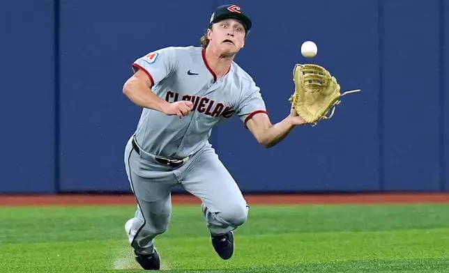 Cleveland Guardians center fielder Petey Halpin makes the catch on a fly out by Tampa Bay Rays' Chandler Simpson during the eighth inning of a baseball game Friday, July 24, 2026, in St. Petersburg, Fla. (AP Photo/Chris O'Meara)