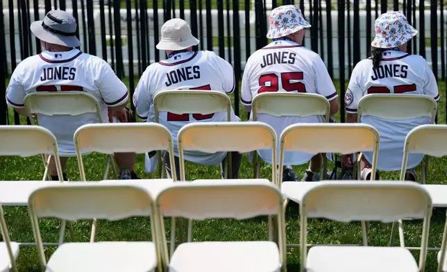 Andruw Jones supporters wait for the start of the Baseball Hall of Fame induction ceremony in Cooperstown, N.Y., Sunday, July 26, 2026. (AP Photo/Seth Wenig)