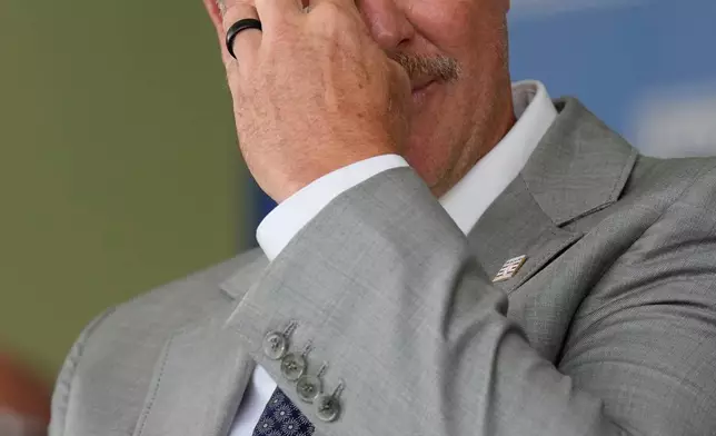 Jeff Kent wipes away tears during the Baseball Hall of Fame induction ceremony in Cooperstown, N.Y., Sunday, July 26, 2026. (AP Photo/Seth Wenig)