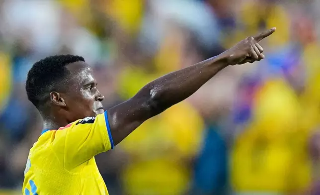 Colombia's Jhon Arias (11) reacts after scoring his team's first goal during the World Cup round of 32 soccer match between Colombia and Ghana in Kansas City, Mo., Friday, July 3, 2026. (AP Photo/Charlie Riedel)