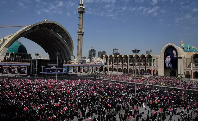 Mourners attend the start of the dayslong funeral ceremonies for slain Iranian Supreme Leader Ayatollah Ali Khamenei and members of his family at the Imam Khomeini Mosalla Grand Mosque in Tehran, Iran, Saturday, July 4, 2026. (AP Photo/Altaf Qadri)