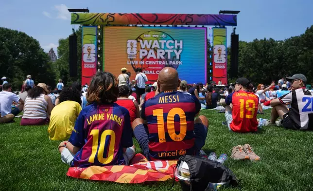 Fans gather for a watch party in Central Park ahead of the World Cup final soccer match between Argentina and Spain, Sunday, July 19, 2026, in New York. (AP Photo/Anna Connors)