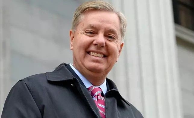 FILE - Sen. Lindsey Graham, R- S.C., walks down the steps of the State Capitol building in Columbia, S.C., Jan. 14, 2015. (AP Photo/Richard Shiro, File)