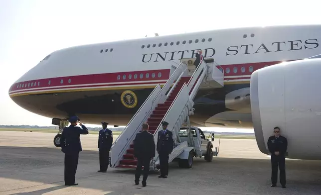 President Donald Trump boards Air Force One, Wednesday, July 1, 2026, at Joint Base Andrews, Md. (AP Photo/Julia Demaree Nikhinson)