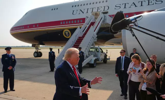 President Donald Trump speaks to reporters before boarding Air Force One, Wednesday, July 1, 2026, at Joint Base Andrews, Md. (AP Photo/Julia Demaree Nikhinson)