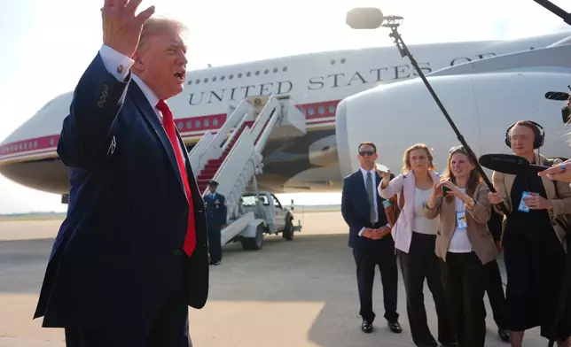 President Donald Trump speaks to reporters before boarding Air Force One, Wednesday, July 1, 2026, at Joint Base Andrews, Md. (AP Photo/Julia Demaree Nikhinson)