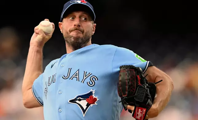 Toronto Blue Jays staring pitcher Max Scherzer throws during the second inning of a baseball game against the Washington Nationals, Monday, July 27, 2026, in Washington. (AP Photo/John McDonnell)