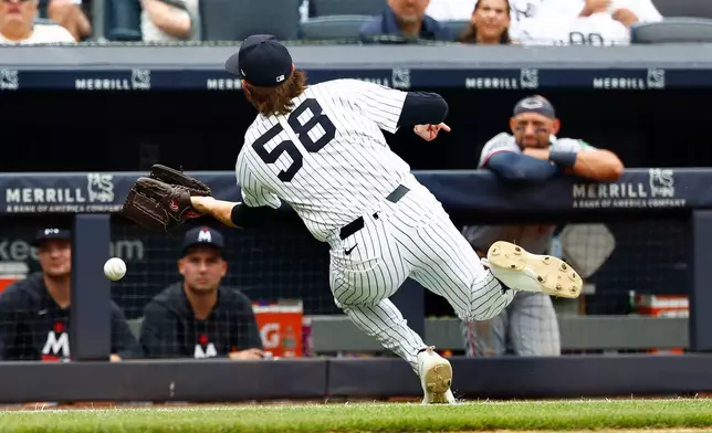 New York Yankees pitcher Paul Blackburn (58) misses a ball hit into foul territory by Minnesota Twins' Kyler Fedko during the fifth inning of a baseball game, Sunday, July 5, 2026, in New York. (AP Photo/Noah K. Murray)