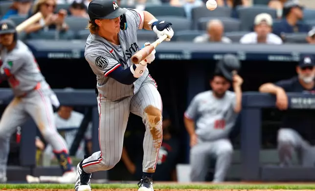 Minnesota Twins' Luke Keaschall bunts against the New York Yankees during the sixth inning of a baseball game, Sunday, July 5, 2026, in New York. (AP Photo/Noah K. Murray)