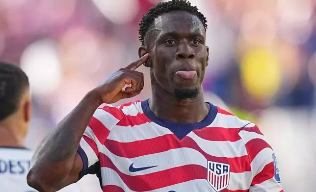 United States' Folarin Balogun (20) reacts after scoring his team's first goal during the World Cup round of 32 soccer match between the United States and Bosnia in Santa Clara, Calif., near San Francisco, Wednesday, July 1, 2026. (AP Photo/Julio Cortez)