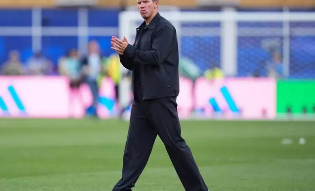Germany head coach Julian Nagelsmann acknowledges the fans after a loss during the World Cup round of 32 soccer match between Germany and Paraguay in Foxborough, Mass., near Boston, Monday, June 29, 2026. (AP Photo/Martin Meissner)