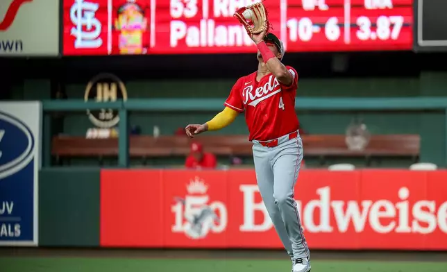Cincinnati Reds' Noelvi Marte catches a fly ball for an out against St. Louis Cardinals' Masyn Winn during the fourth inning of a baseball game Saturday, July 25, 2026, in St. Louis. (AP Photo/Scott Kane)