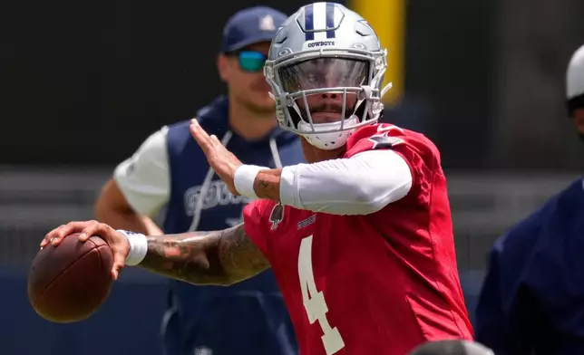 Dallas Cowboys quarterback Dak Prescott passes during the NFL football team's training camp, Wednesday, July 29, 2026, in Oxnard, Calif. (AP Photo/Mark J. Terrill)
