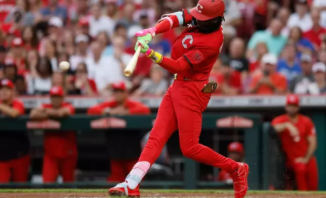 Cincinnati Reds' Jose De La Cruz singles against the Chicago Cubs during the third inning of a baseball game, Saturday, July 11, 2026, in Cincinnati. (AP Photo/Jay LaPrete)