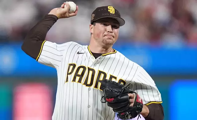San Diego Padres' Mason Miller throws in the ninth inning during the MLB baseball All-Star Game between the American League and National League, Tuesday, July 14, 2026, in Philadelphia. (AP Photo/Matt Rourke)