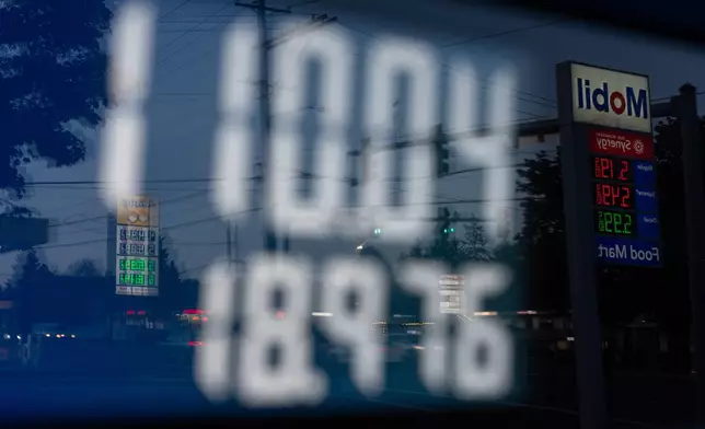 FILE - A display shows $110.04 for gasoline on a fuel pump at a Mobil gas station on Wednesday, April 29, 2026, in Portland, Ore. (AP Photo/Jenny Kane, File)