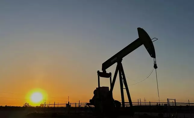 FILE - The sun sets as a pump jack operates near Loving, N.M., on Tuesday, May 20, 2025. (AP Photo/Susan Montoya Bryan, File)
