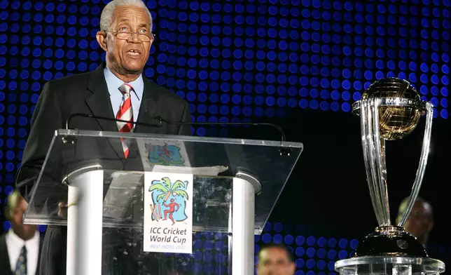 FILE - West Indies' cricket legend Sir Garfield Sobers speaks during the opening ceremony of the ICC Cricket World Cup at Trelawny Stadium, Jamaica, March 11, 2007. (AP Photo/Andres Leighton, File)