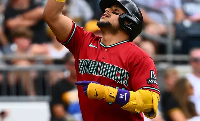 Arizona Diamondbacks' Gabriel Moreno celebrates as he rounds the bases after hitting a two-run home run off of Pittsburgh Pirates pitcher Jared Jones during the fourth inning of a baseball game in Pittsburgh, Wednesday, July 29, 2026. (AP Photo/Justin Berl)