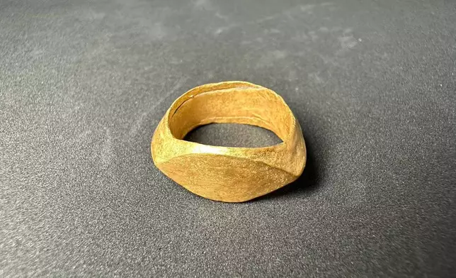 This photo released by The Fine Arts Department, shows a gold ring at the Don Yai Thong archeological site in Phetchaburi province, Thailand, Thursday, July 2, 2026. (The Fine Arts Department via AP)
