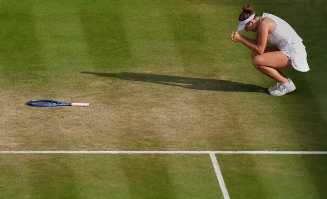 Linda Noskova of Czech Republic, celebrates after defeating Marta Kostyuk of Ukraine in their women's singles semifinal match at the Wimbledon Tennis Championships in London, Thursday, July 9, 2026. (AP Photo/Maja Smiejkowska)