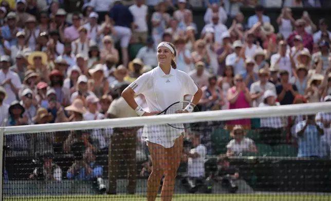 Karolina Muchova of the Czech Republic celebrates her victory against Coco Gauff of the United States in their semifinal women's singles match at the Wimbledon Tennis Championships in London, Thursday, July 9, 2026. (AP Photo/Kin Cheung)