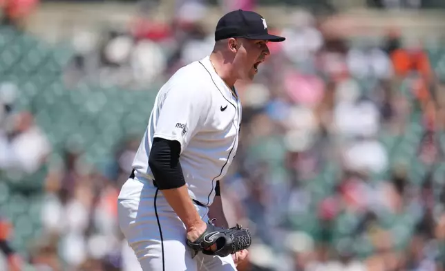 Detroit Tigers pitcher Tarik Skubal reacts to striking out Philadelphia Phillies' Kyle Schwarber to end the fifth inning Sunday, July 12, 2026, in Detroit. (AP Photo/Paul Sancya)