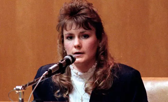 FILE - Pamela Smart answers questions from the defense in her murder conspiracy trial, March 18, 1991, in Rockingham County Superior Court in Exeter, N.H. (AP Photo/Jon Pierre Lasseigne, File)