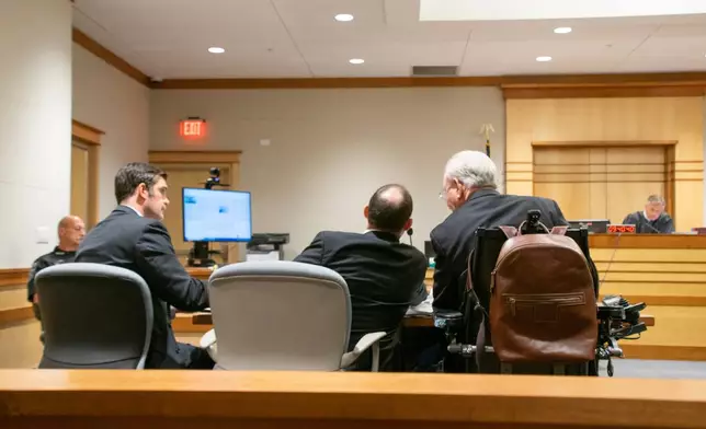 Members of the New Hampshire Solicitor General's office speak at a hearing for Pamela Smart, who is serving life in prison for orchestrating the murder of her husband by her teenage student, at Merrimack Superior Court in Concord, N.H., Monday, July 20, 2026. (Grace Chai/Seacoast Media via AP, Pool)