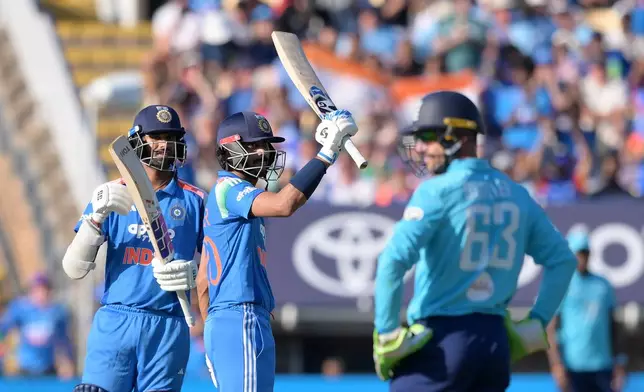 India's Axar Patel celebrates his fifty during the first ODI cricket match between England and India in Birmingham, England, Tuesday, July 14, 2026. (Gary Oakley/PA via AP)