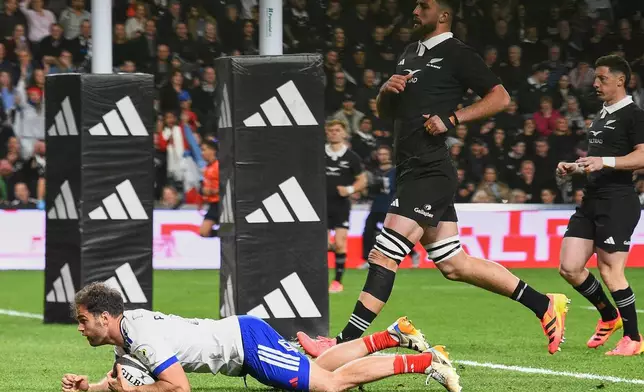 France's Damian Penaud scores a try during the Nations Championship rugby international between the All Blacks and France in Christchurch New Zealand, Saturday, July 4, 2026. (Chris Symes/Photosport via AP)