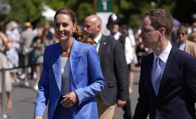 Britain's Kate, the Princess of Wales walks, during a visit on day four of the Wimbledon Tennis Championships in London, Thursday, July 2, 2026. (AP Photo/Andrew Matthews)