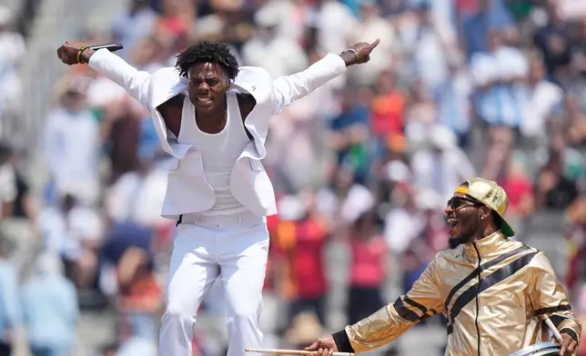 Influencer IShowSpeed performs before the World Cup final soccer match between Spain and Argentina in East Rutherford, N.J., near New York, Sunday, July 19, 2026. (AP Photo/Frank Franklin II)