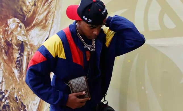 Spain's Lamine Yamal arrives for the World Cup final soccer match between Spain and Argentina in East Rutherford, N.J., near New York, Sunday, July 19, 2026. (AP Photo/Pamela Smith)