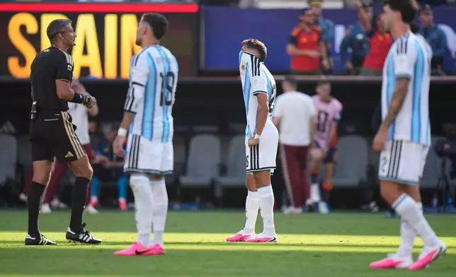 Argentina players react after Spain's Ferran Torres (7) scored the opening goal during the World Cup final soccer match between Spain and Argentina in East Rutherford, N.J., near New York, Sunday, July 19, 2026. (AP Photo/Frank Franklin II)