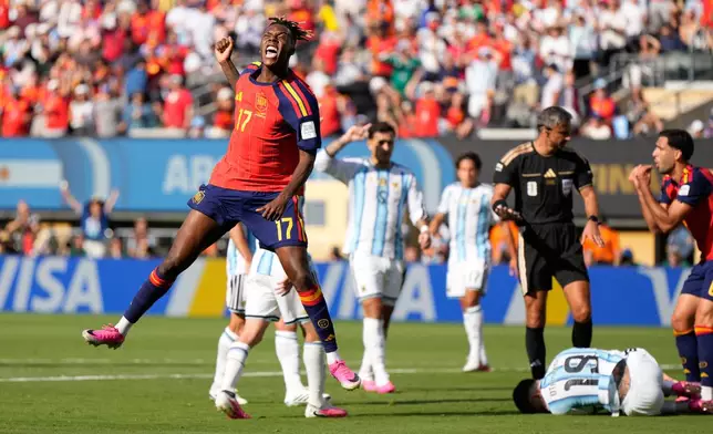 Spain's Nico Williams celebrates after scoring a goal that was disallowed during the World Cup final soccer match between Spain and Argentina in East Rutherford, N.J., near New York, Sunday, July 19, 2026. (AP Photo/Ashley Landis)