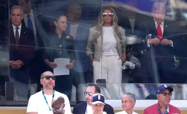 Canada's Prime Minister Mark Carney, from left, Mexico's President Claudia Sheinbaum, first lady Melania Trump and President Donald Trump attend the World Cup championship final soccer match between Spain and Argentina in East Rutherford, N.J., Sunday, July 19, 2026. (AP Photo/Jacquelyn Martin)